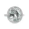 18ct White Gold Aquamarine and DIamond Halo Ring