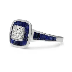18ct White Gold Cushion Cut Diamond and Channel Set Sapphire Halo Ring