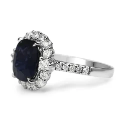 18ct White Gold Cushion Sapphire and Diamond Halo Ring