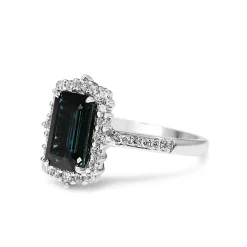 18ct White Gold Emerald Cut Sapphire and Diamond Halo Ring