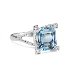 18ct White Gold Emerald Cut Aquamarine and Diamond Claw Cocktail Ring