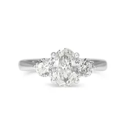 18ct White Gold Oval and Brilliant Cut Diamond 3 Stone Ring