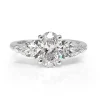 18ct White Gold Oval and Pear Cut Diamond 3 Stone