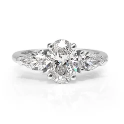 18ct White Gold Oval and Pear Cut Diamond 3 Stone