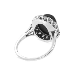 14ct White Gold Synthetic Star Sapphire and Diamond Halo Ring