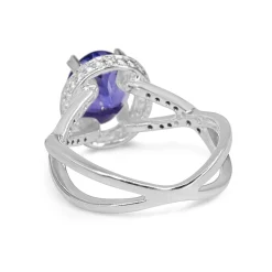 18ct White Gold Tanzanite and Diamond Halo and Twist Ring