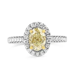 18ct Yellow and White Gold Oval Yellow Diamond Halo Ring