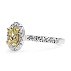18ct Yellow and White Gold Oval Yellow Diamond Halo Ring