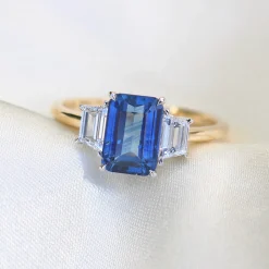 18ct Yellow and White Gold Emerald Cut Sapphire and Baguette Diamond Ring