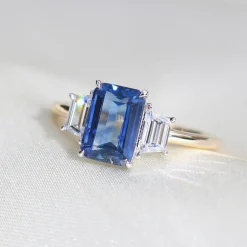18ct Yellow and White Gold Emerald Cut Sapphire and Baguette Diamond Ring