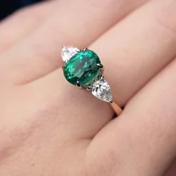 18ct Yellow and White Gold Emerald and Pear Shaped Diamond 3 Stone Ring