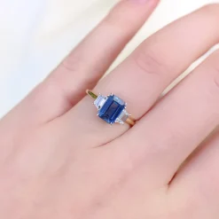 18ct Yellow and White Gold Emerald Cut Sapphire and Baguette Diamond Ring