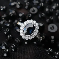18ct Yellow and White Gold Oval Sapphire and Diamond Daisy Style Ring