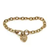 9ct Yellow Gold and Silver Filled Bracelet with Cubic Zirconia Heart Padlock