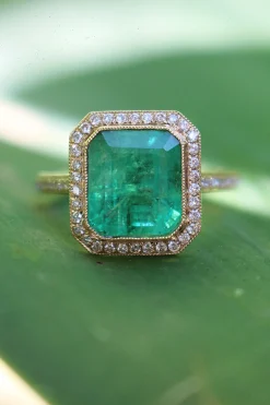 18ct Yellow Gold Emerald and Diamond Halo Ring