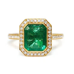 18ct Yellow Gold Emerald Cut Emerald and Diamond Halo Ring