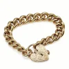 9ct Yellow Gold Graduated Curb Link Bracelet with Heart Padlock