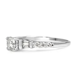 Platinum Diamond Solitaire Ring with Baguette Diamonds