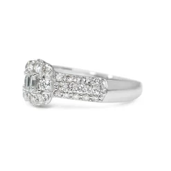 Platinum Emerald and Brilliant Cut Pavé Diamond Ring
