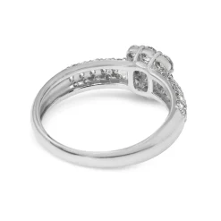 Platinum Emerald and Brilliant Cut Pavé Diamond Ring