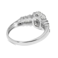 Platinum Emerald, Brilliant and Baguette Diamond Ring
