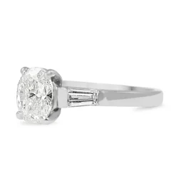 Platinum Oval and Baguette Diamond Ring