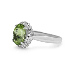 Platinum Peridot and Diamond Halo Ring
